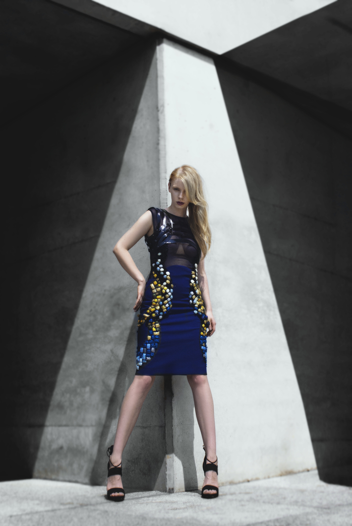 Hand-embroidered, silk dress with lacquered, leather straps 