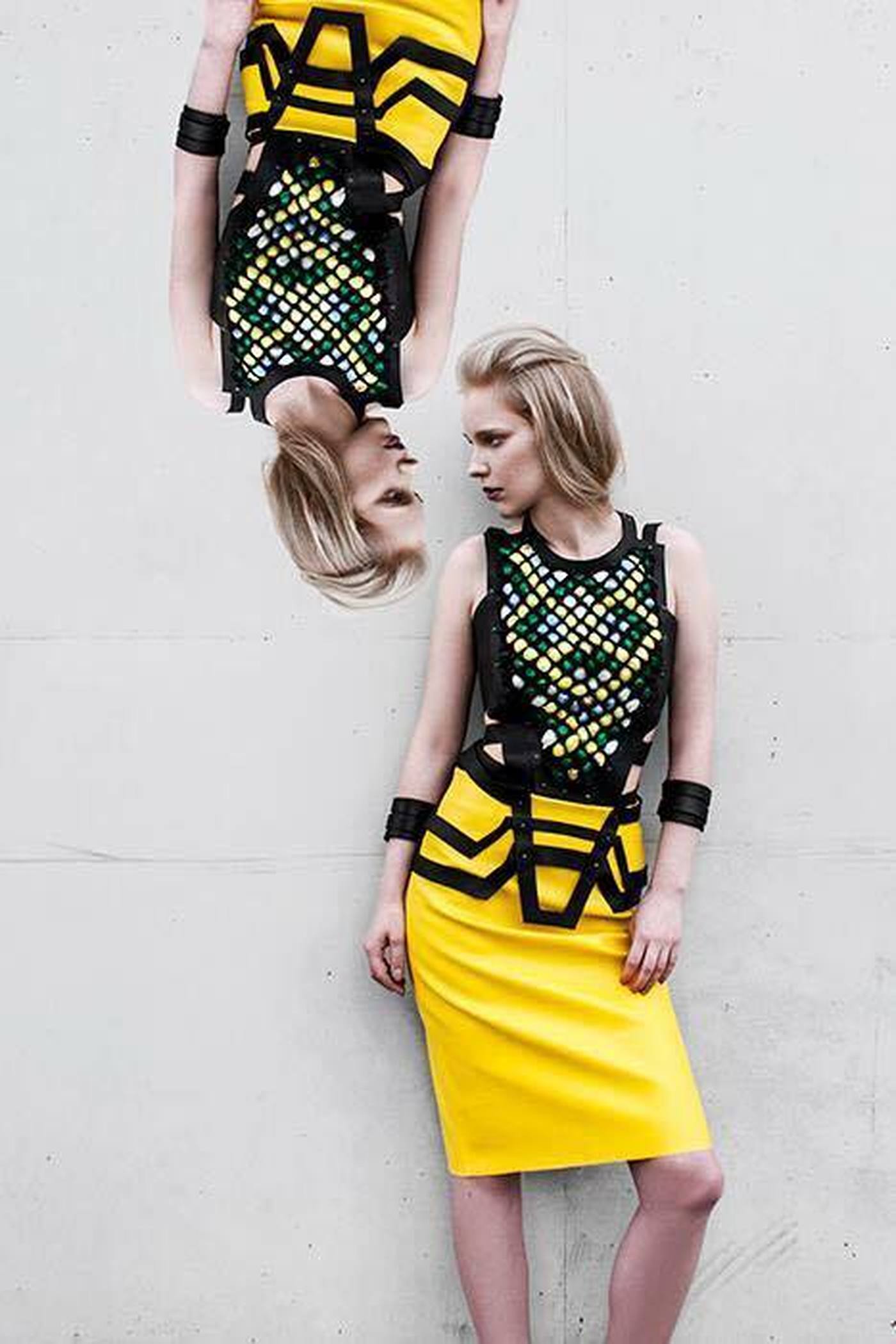 Hand-embroidered leather top with a yellow, leather pencil skirt and geometrical, leather belt 