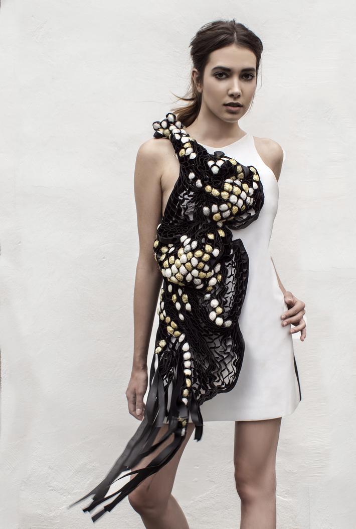 Look 6

Hand-embroidered, sculptural leather dress  